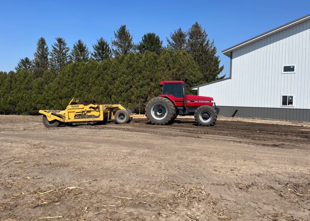 tractor leveling dirt