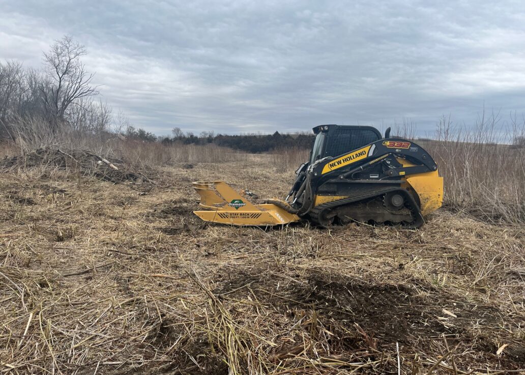 skid loader in field